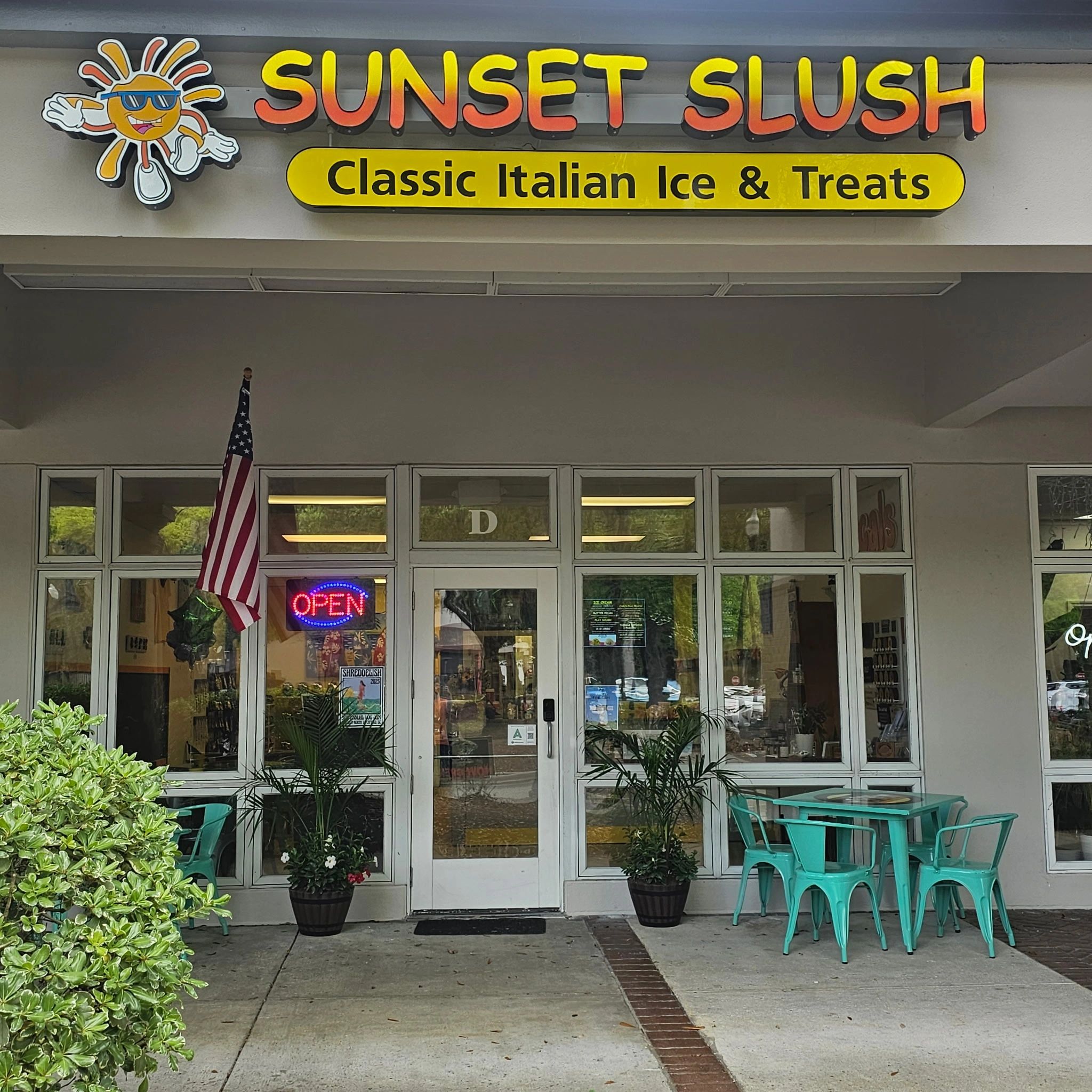 Sunset Slush storefront open sign